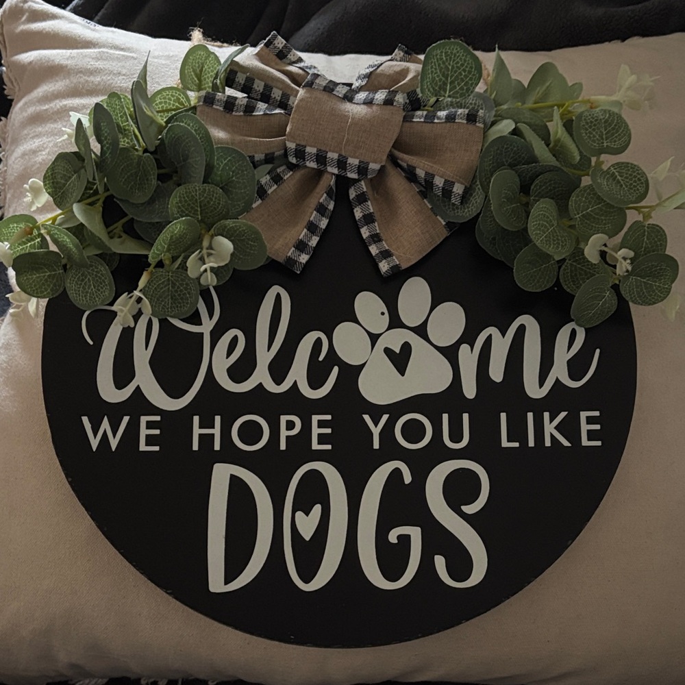 Black Welcome Sign with Greenery and Bow